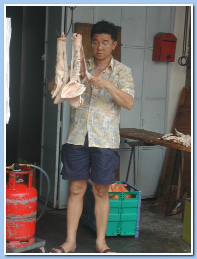 Cleaning pigs' heads